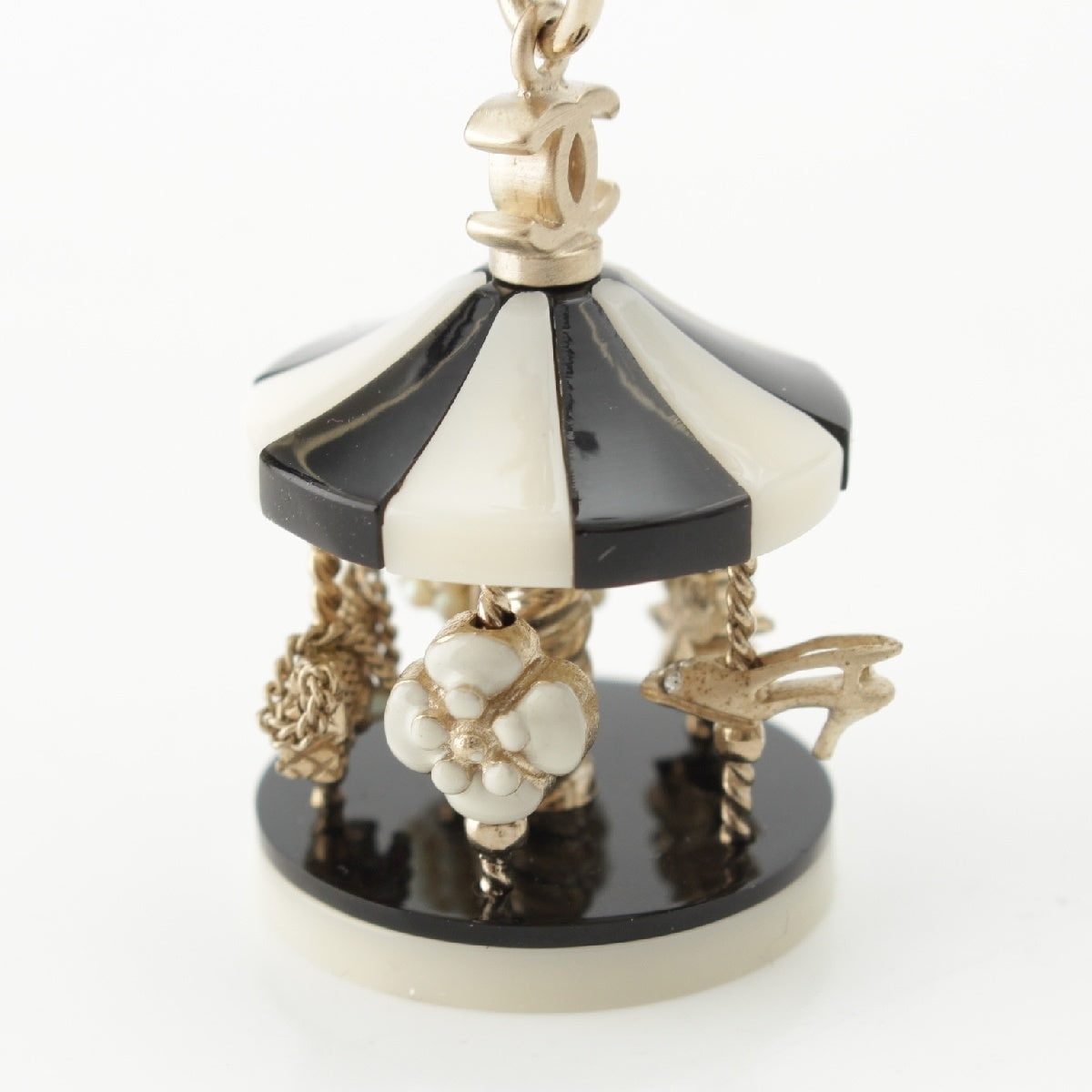 CHANEL 08A Merry-go-round motif bag charm Black x white