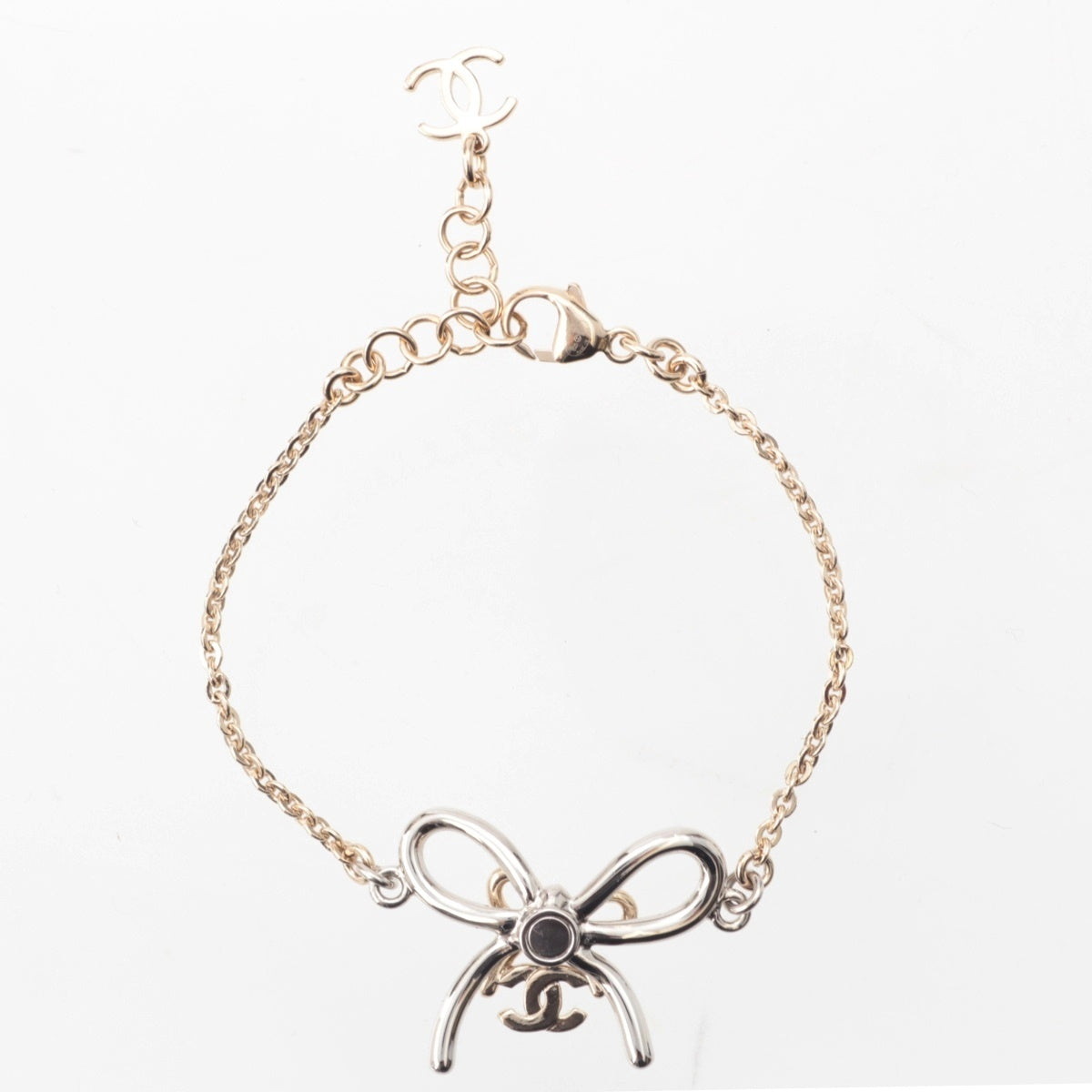 CHANEL Metal & Strass Butterfly Ribbon Logo bracelet ABG590 Gold silver